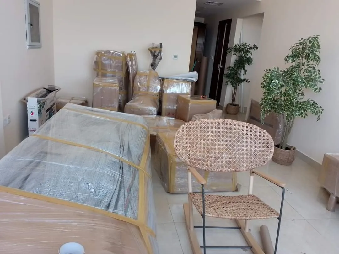 Moving van transporting belongings across Dubai